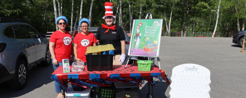 staff volunteers at school event