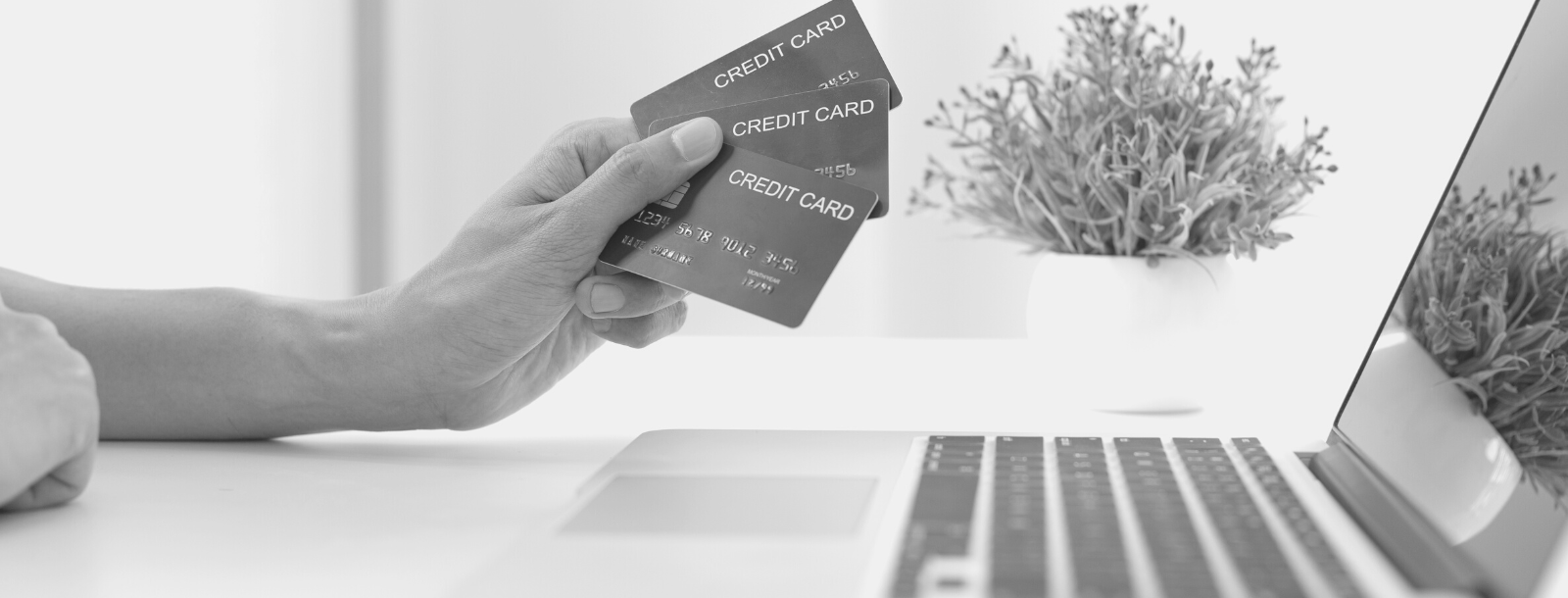 man with 3 credit cards